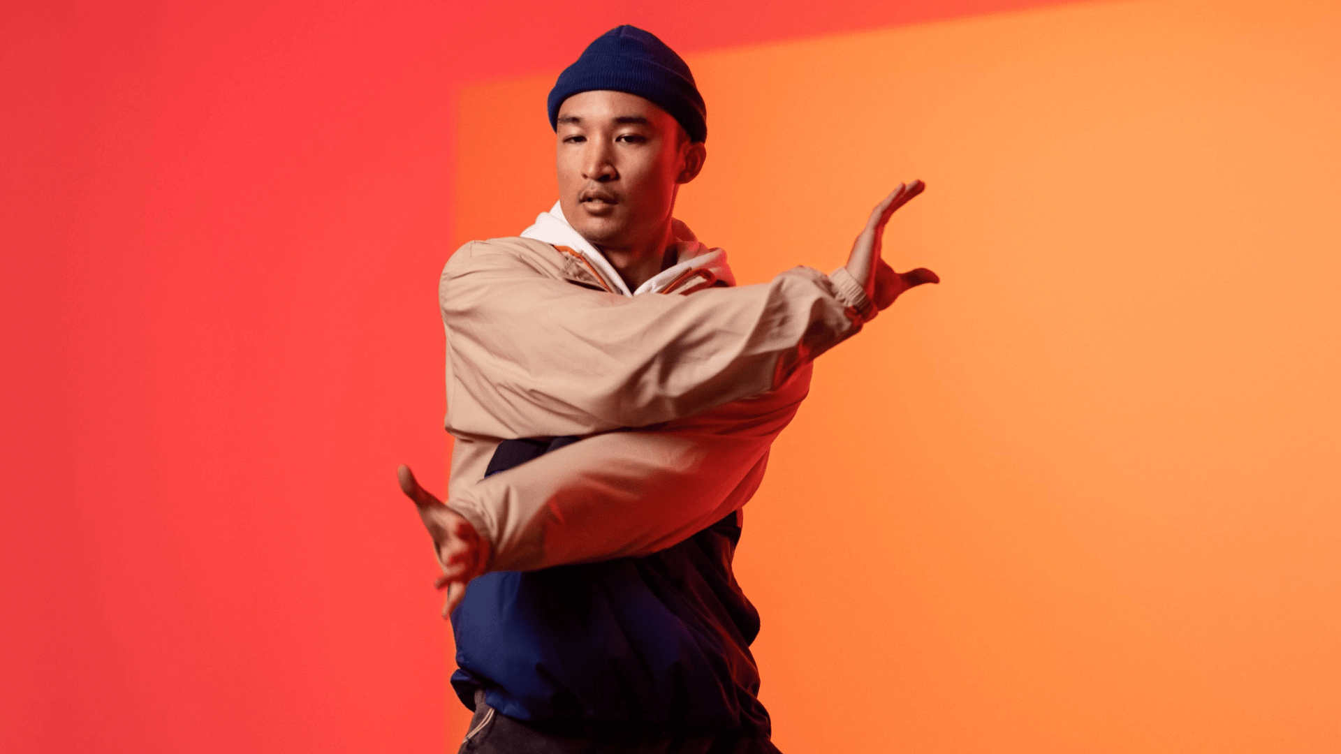 Woman laughing wearing Styletto AX hearing aids