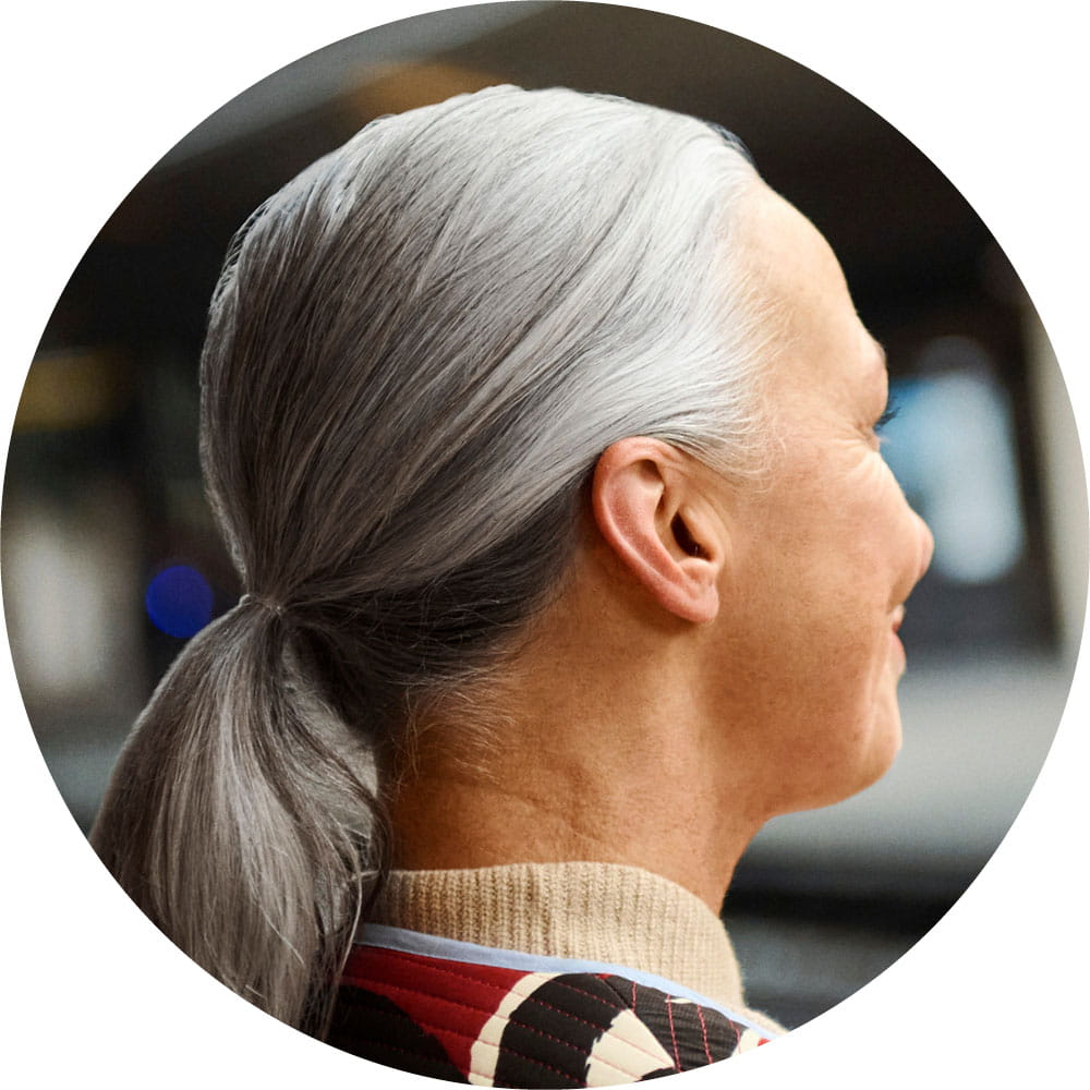Portrait of woman wearing Insio IX hearing aids