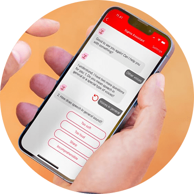 Coach olding smartphone with Signia Assistant chat screen