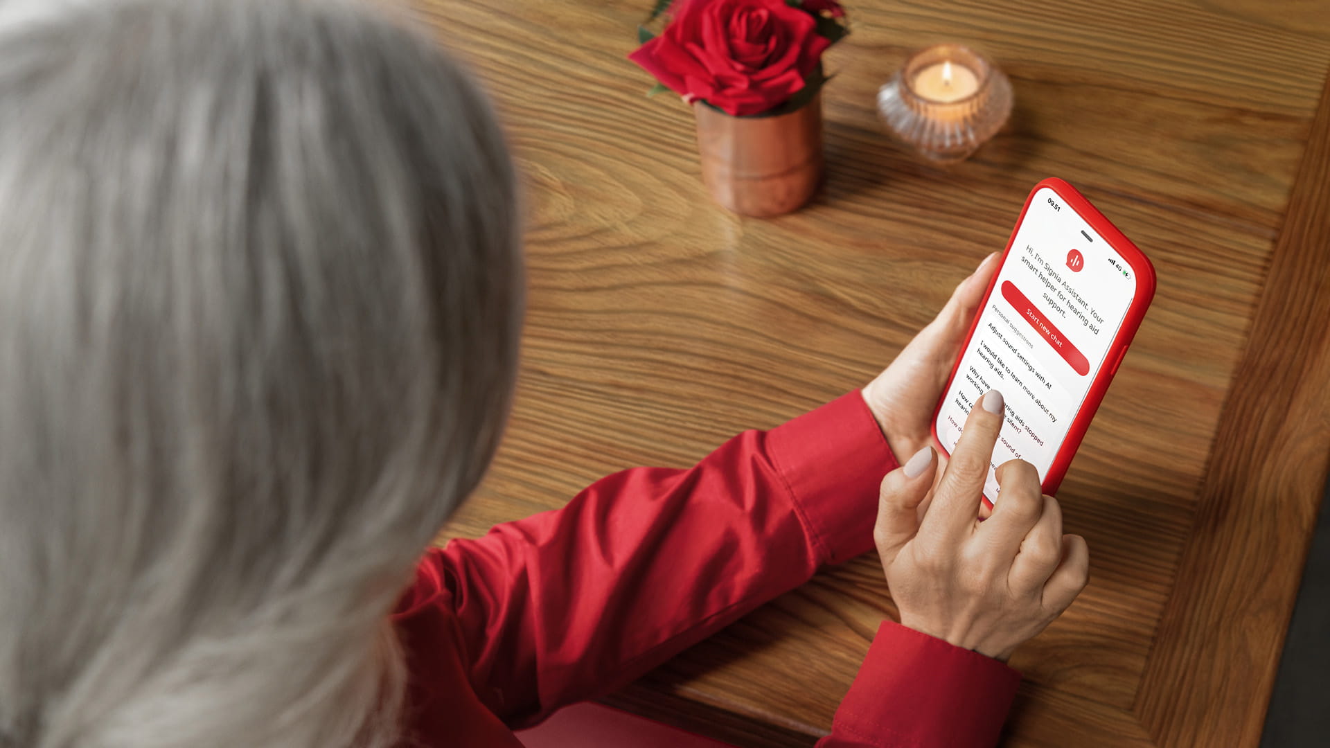 Woman using Signia Assistant app