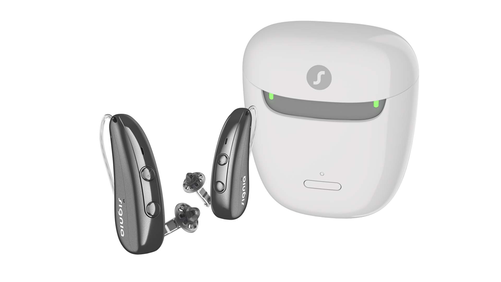 Pure Charge&Go IX hearing aids next to the Portable Charger